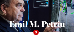 Image of Dr Emil M. Petriu gesturing to a video screen displaying video analytics.
